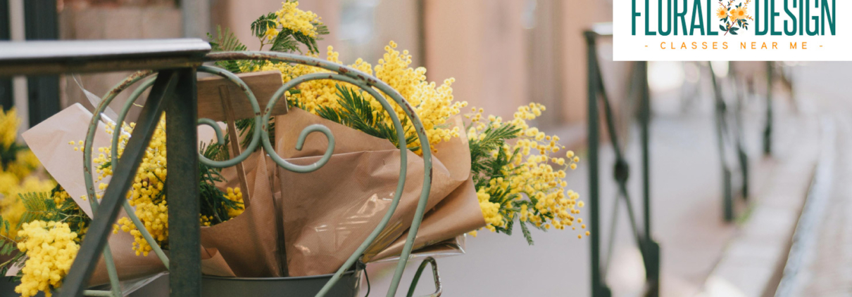 Floral design students creating large-scale wedding installation